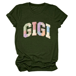 Detail of GIGI patchwork applique with floral fabrics on olive green crewneck t-shirt