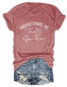 Flat lay of rust red cotton t-shirt with funny quote and distressed denim shorts