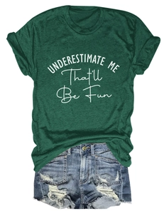 Flat lay of green round neck t-shirt with slogan and distressed denim shorts