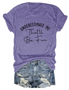 Flat lay of purple cotton T-shirt with black slogan print and frayed denim shorts