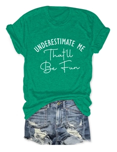 Flat lay of green cotton t-shirt with slogan and distressed denim shorts for summer