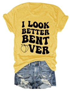 Flat lay of yellow cotton T-shirt with black letter print and denim shorts outfit