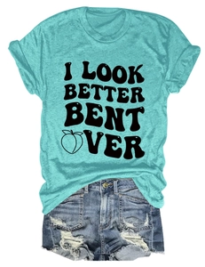 Teal t-shirt with slogan and peach print paired with distressed denim shorts