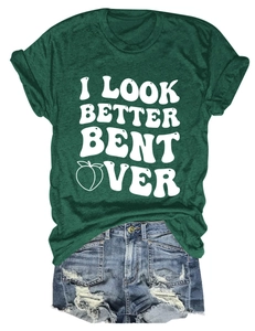 Flat lay of green cotton t-shirt with text print and distressed denim shorts