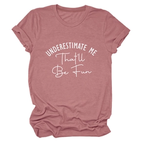 Detail of soft dusty rose t-shirt showing the white graphic slogan print and crew neck