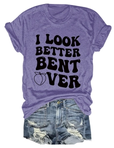 Flat lay of purple crew neck tee with text print and distressed blue denim shorts