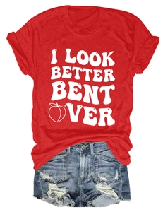 Flat lay of a red cotton T-shirt with graphic print and ripped blue denim shorts