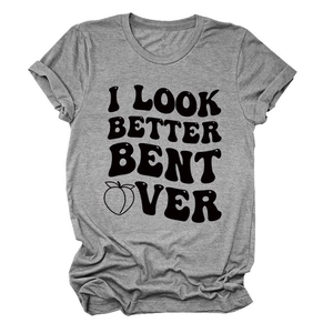 Detail of grey crewneck t-shirt featuring black bold text print and peach graphic