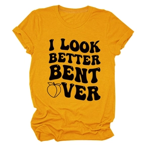 Detail of ginger yellow crew neck t-shirt with black graphic text print and peach design