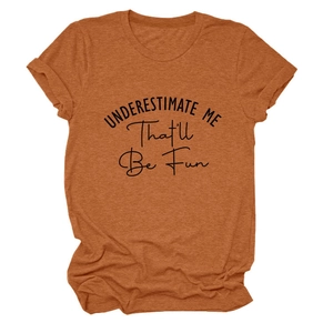 Detailed flat lay of burnt orange T-shirt featuring black slogan and soft cotton texture
