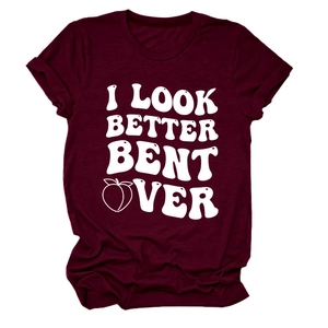 Detailed shot of the white slogan and peach icon print on this burgundy crew neck t-shirt