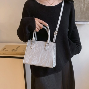Silver wrinkled texture large tote bag for women with gold hardware and shoulder strap