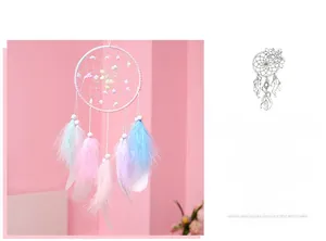Detail of dream catcher with colorful feathers and handmade woven net in pastel colors