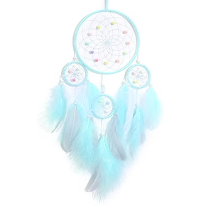 Handmade mint blue dream catcher with colorful beads and soft feathers for wall decor
