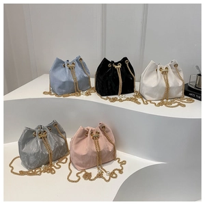Chic drawstring bucket bags with gold chain and pearl accents in five elegant colors