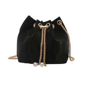 Elegant black velvet bucket bag with gold chain strap and pearl drawstring details