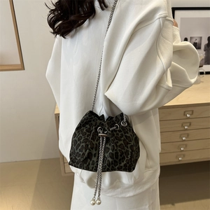 Chic leopard print drawstring bucket bag with silver chain and pearl charms for women