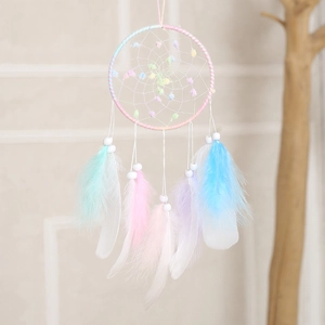 Handmade dream catcher with pastel pink blue feathers and beads home wall hanging decor