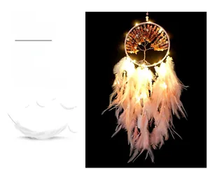 Pink tree of life dreamcatcher with warm LED lights and hanging decorative feathers