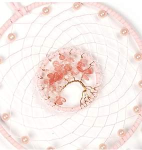 Detail of life tree dream catcher with pink crystal stones and polished imitation pearls