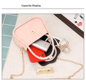 Internal capacity of stylish pink marble textured small square bag with metal chain