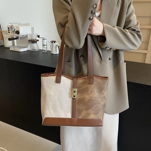 Chic beige and brown patchwork tote bag with gold metal lock for women in autumn