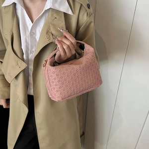 Pink woven pillow bag for women with gold zipper and stylish cross-weave texture