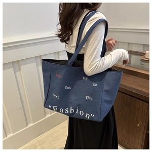 Fashionable large blue denim tote bag for women with stylish red and white print