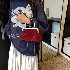 Vintage burgundy velvet shell bag with white polka dots and pearl top handle