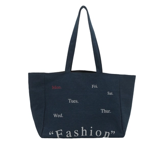 Minimalist navy canvas tote bag with fashion weekday text print for daily commuting
