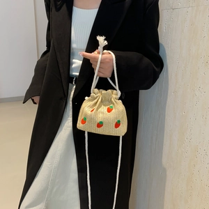 Straw drawstring bucket bag with strawberry embroidery and soft cotton rope handle