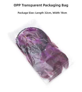 Macro detail of a purple tree of life dreamcatcher pendant in professional OPP packaging