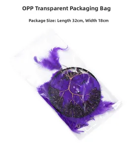 Detail showing life of tree dream catcher with purple feathers in 32x18cm OPP packaging