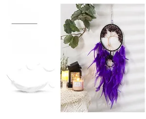 Detail view of purple feather dreamcatcher with hand-woven Tree of Life in wall decor setting