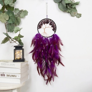 Purple dreamcatcher with life tree design and hanging feathers for home wall decoration