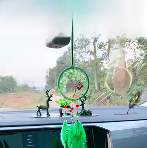 Car mirror charm with green tree of life, Santa Claus, and vibrant green feathers