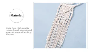 Detail of bohemian woven wall hanging featuring cotton triangles and long fringe tassels