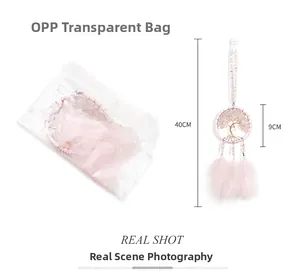 Detailed view of Tree of Life car ornament with pink feathers showing 40cm length