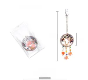 Detail view of handmade Tree of Life car pendant with orange maple leaves and 30cm chain