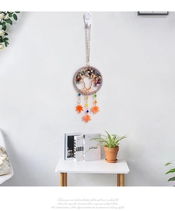 Detailed handcrafted Tree of Life car ornament with colorful stones and maple leaf charms
