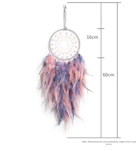 Detail of 16cm diameter dream catcher with pink feathers and pearls, 60cm total length