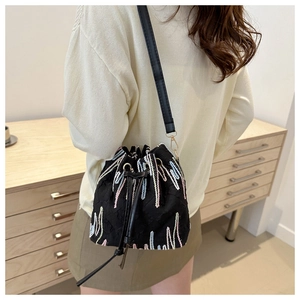 Retro canvas bucket bag with colorful embroidery and drawstring closure for women