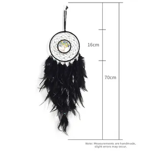 Detail view of black dream catcher with tree of life design and 16cm by 70cm dimensions