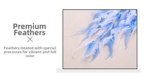 Detailed view of soft light blue and white gradient feathers with delicate white beads