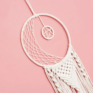 Large bohemian moon dreamcatcher wall hanging with white macrame fringe and star detail