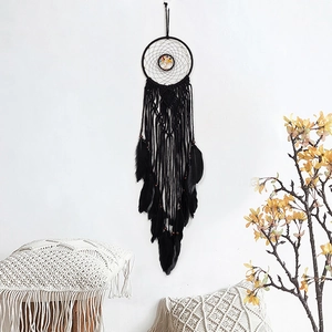 Large black bohemian macrame dream catcher wall hanging with feathers and tree of life