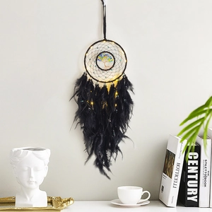 Black tree of life dreamcatcher with warm LED lights and hanging feathers for home decor