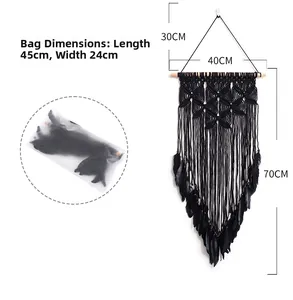 Detail of black handmade bohemian dream catcher wall hanging with feather size dimensions
