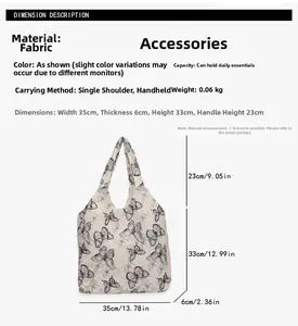 Detailed dimension guide for white canvas tote bag featuring black butterfly prints