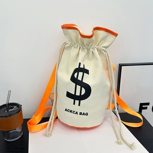 Chic beige canvas drawstring bucket backpack with orange straps and black dollar sign print